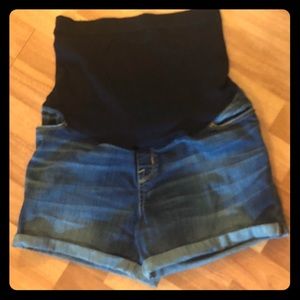 Medium denim maternity jean shorts with support.